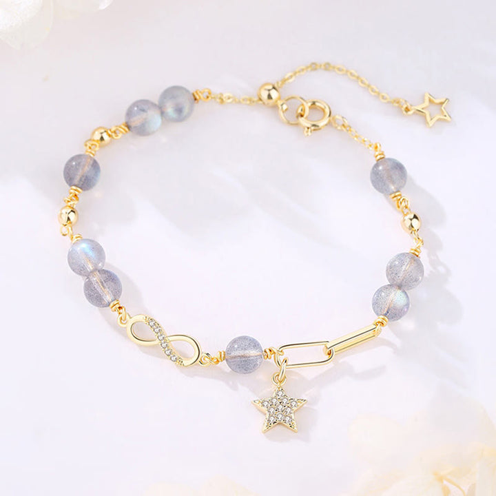 Buddha Stones 14K placcato oro naturale quarzo fragola pietra di luna Möbius Loop Eternal Love Star Bracciale positivo