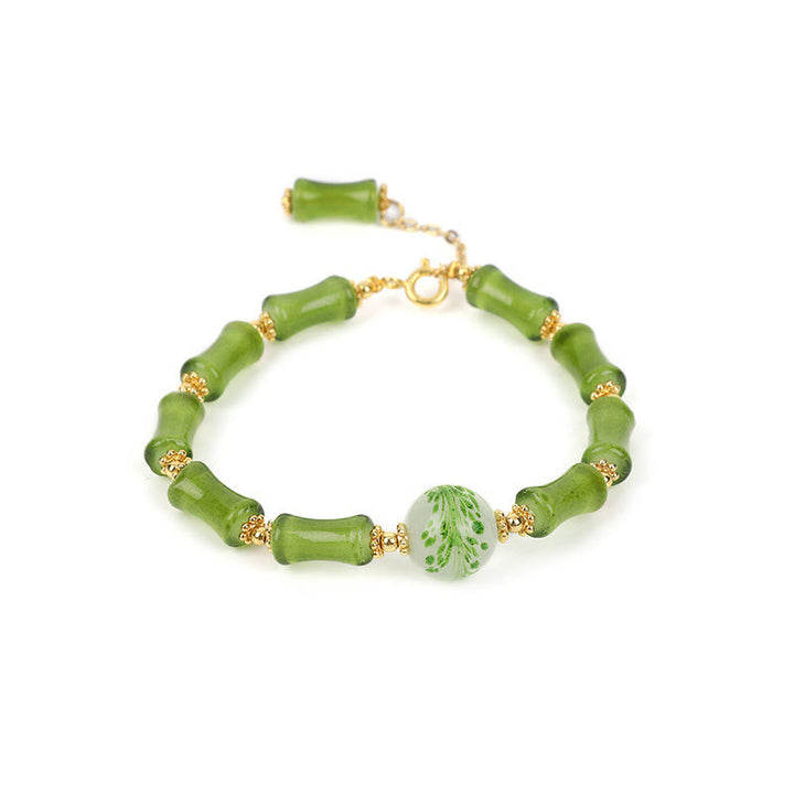 Bracciale a catena della ricchezza in agata muschiata con motivo in bambù verde Buddha Stones Liuli