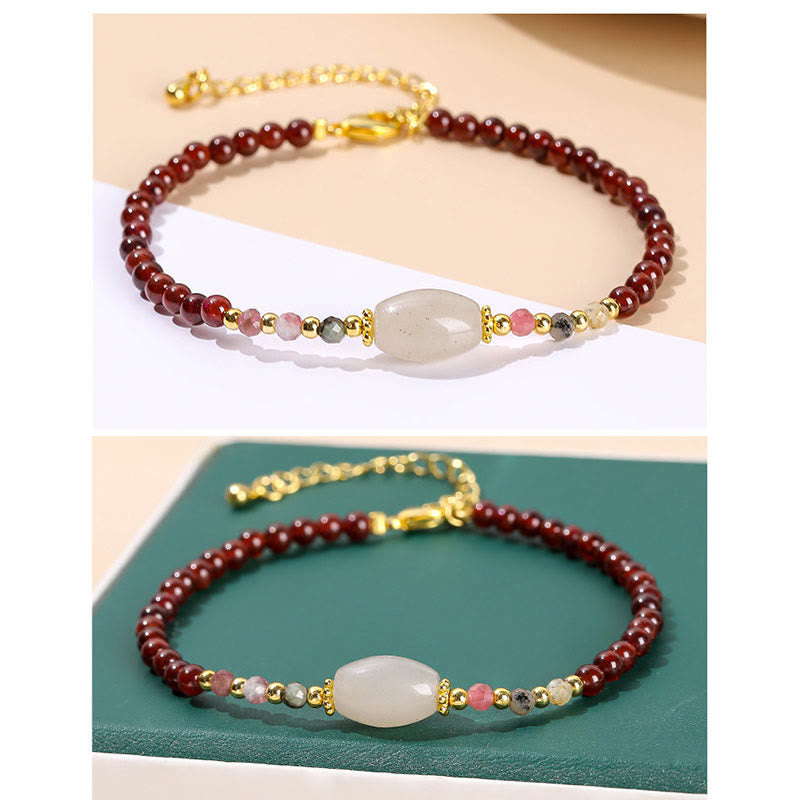 Bracciale Buddha Stones con perline di giada, tormalina e granato