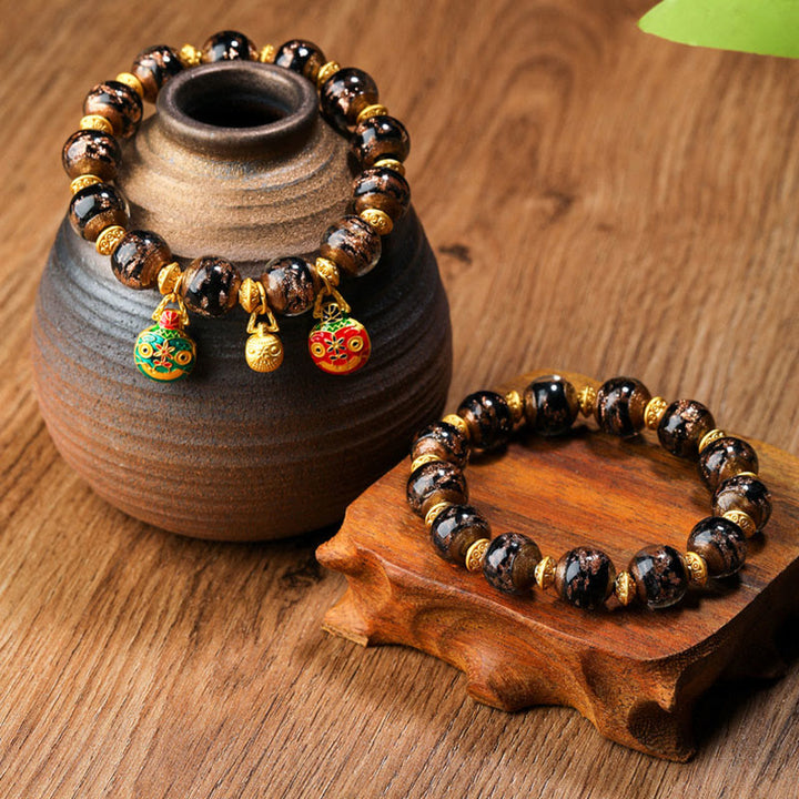 Buddha Stones Oro Deglutizione Bestia Famiglia Ciondolo Liuli Perline di Vetro Braccialetto della Fortuna