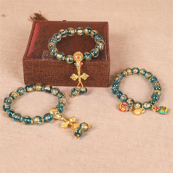 Buddha Stones Tibetan Gold Deglutizione Bestia Famiglia Dorje Vajra Forza Braccialetto di Perline