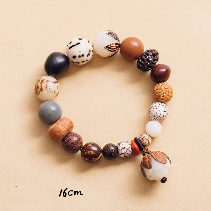 Bracciale Mala da polso Buddha Stones, semi di Bodhi, loto, saggezza, pace