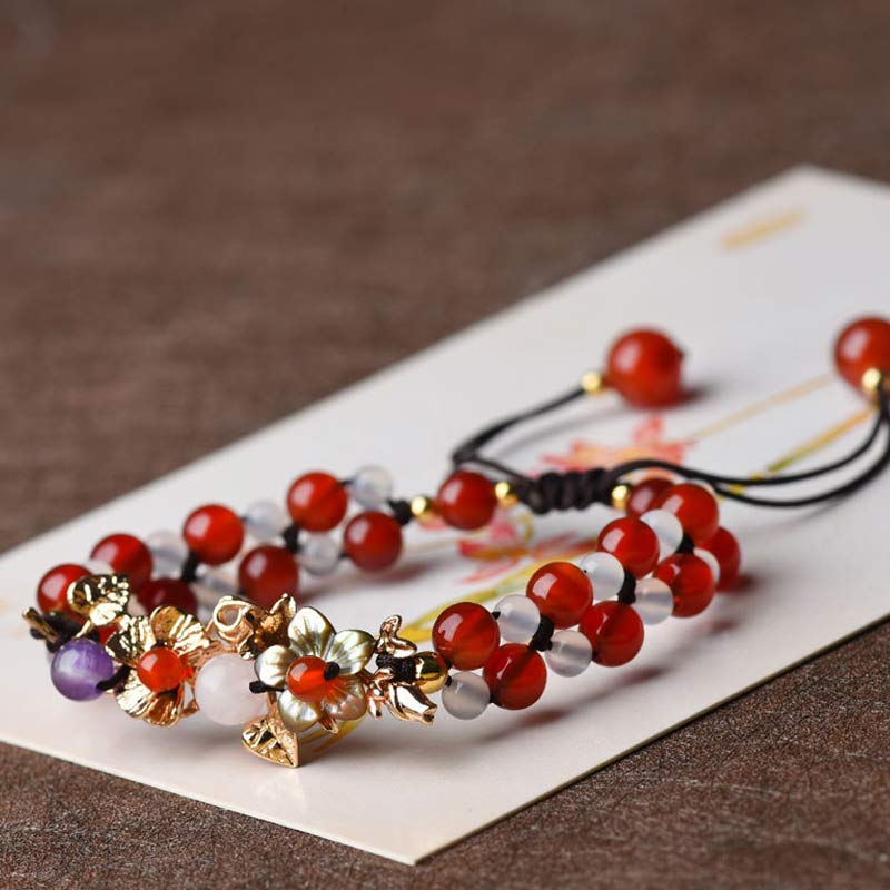 Braccialetto della fortuna con perline di fiore, petalo, avventurina verde e granato Buddha Stones