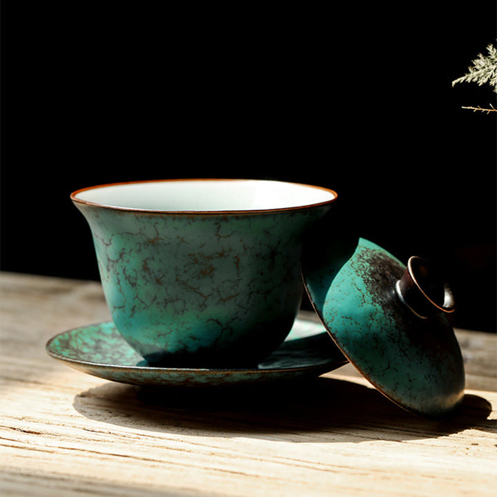 Buddha Stones Retro Green Glaze Ceramic Gaiwan Sancai Tazza da tè Kung Fu Tazza da tè e piattino con coperchio