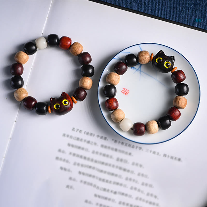 Braccialetto di protezione con incisione di gatto carino in legno di sandalo rosso e ebano con piccole foglie Buddha Stones - image 22