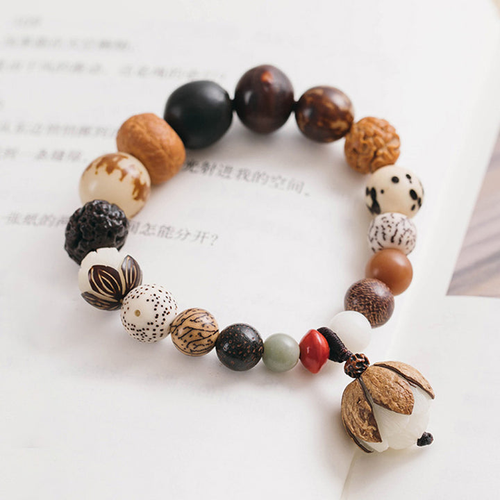 Bracciale Mala da polso Buddha Stones, semi di Bodhi, loto, saggezza, pace