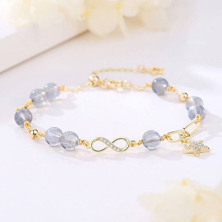 Buddha Stones 14K placcato oro naturale quarzo fragola pietra di luna Möbius Loop Eternal Love Star Bracciale positivo