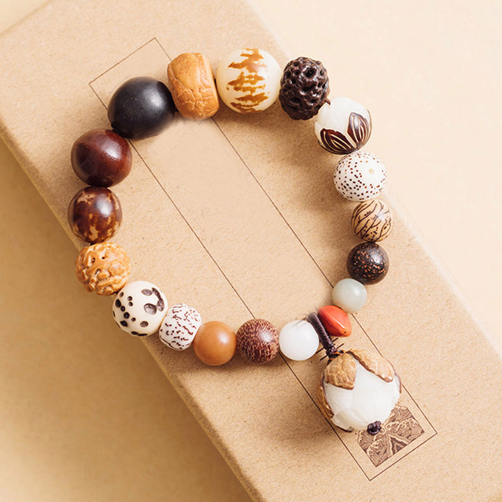 Bracciale Mala da polso Buddha Stones, semi di Bodhi, loto, saggezza, pace