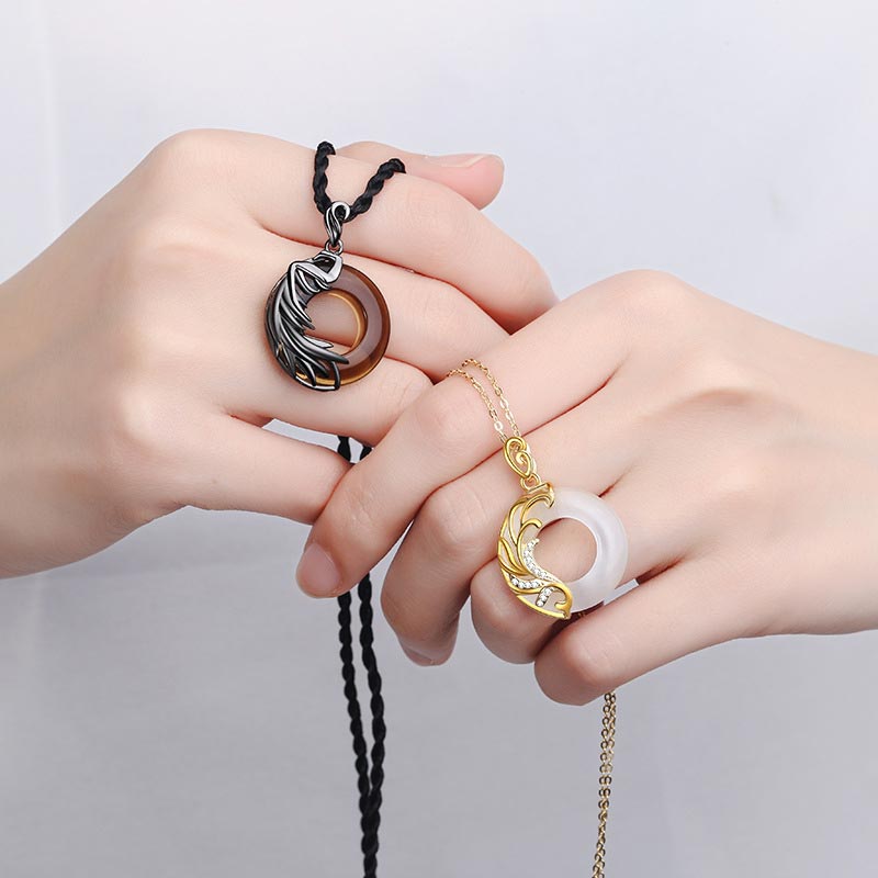 Collana con ciondolo rotondo da meditazione in ossidiana e calcedonio Buddha Stones