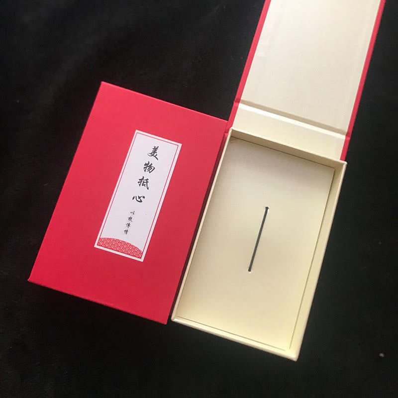 Pettine lenitivo a forma di coniglietto con piccola foglia di sandalo rosso e scatola regalo