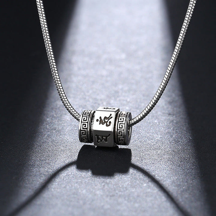 Buddha Stones Tibetano Om Mani Padme Hum Collana della Pace Pendente Girevole - Om Mani Padme Hum e catena da 55 cm - image 1