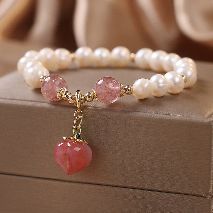 Bracciale con ciondolo a forma di cuore, amore, saggezza, perle naturali, quarzo fragola e pesca Buddha Stones