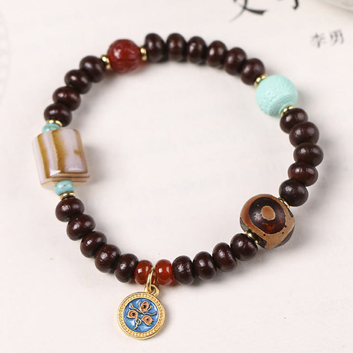 Buddha Stones naturali Tibet viola Bodhi Seed Dzi Bead Dio della ricchezza braccialetto di saggezza