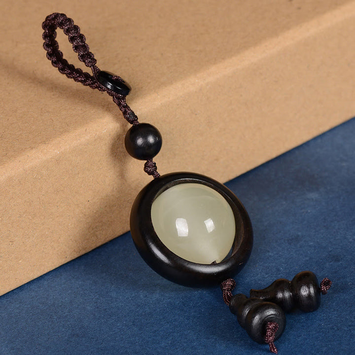 Buddha Stones Sandalo rosso Legno di ebano Sandalo verde Perlina portafortuna luminosa Zucca Portachiavi della pace