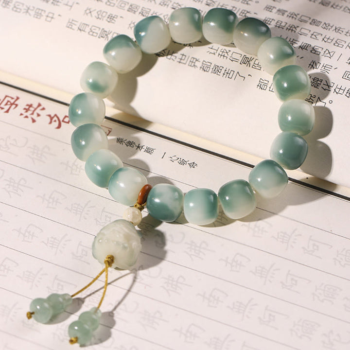 Bracciale della pace Buddha Stones, semi di Bodhi sfumati, volpe a nove code, zampa di gatto, artiglio di pigna - image 8