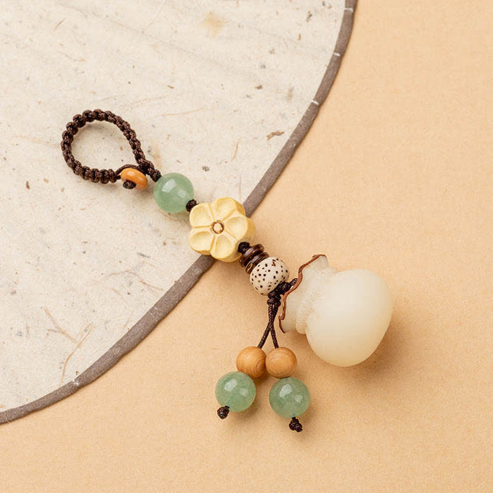 Buddha Stones Seme di Bodhi naturale Sacchetto di soldi Fiore Benedizione Prosperità Portachiavi