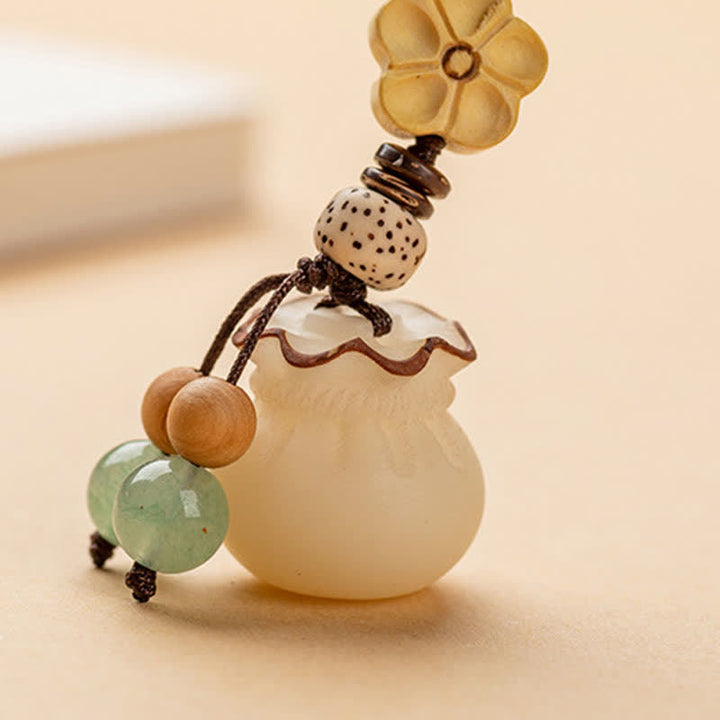 Buddha Stones Seme di Bodhi naturale Sacchetto di soldi Fiore Benedizione Prosperità Portachiavi