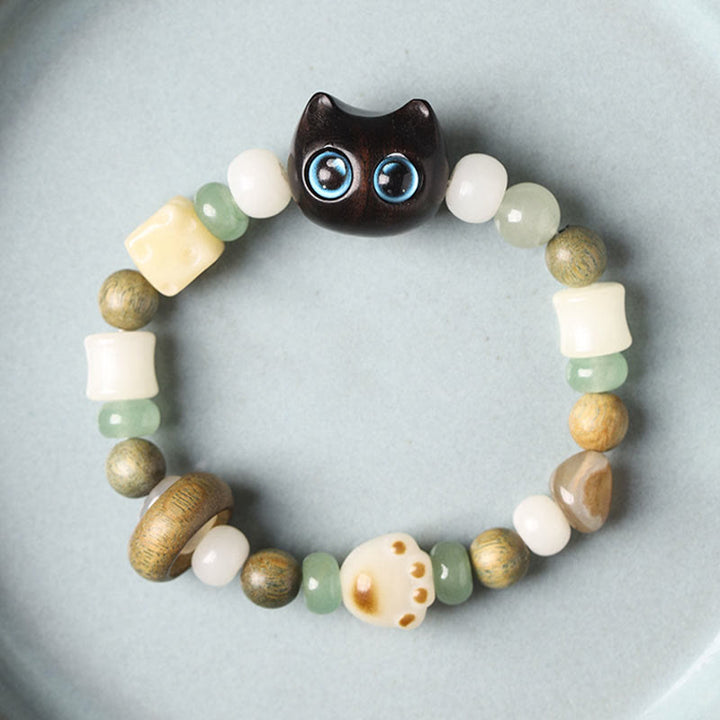 Buddha Stones Semi di Bodhi Sandalo verde Legno di ebano Foglia piccola Sandalo rosso Testa di gatto Zampa Artiglio Bracciale della pace - image 3