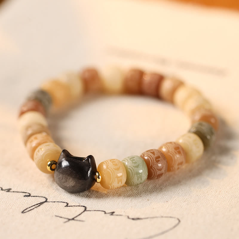 Buddha Stones Semi di Bodhi Argento Lucentezza Ossidiana Testa di Gatto Om Mani Padme Hum Braccialetto Armonia Inciso - Seme di Bodhi giallo (circonferenza del polso 14-16 cm) - image 1