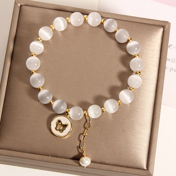 Braccialetto dell'amore con ciondolo a farfalla con occhio di gatto Buddha Stones
