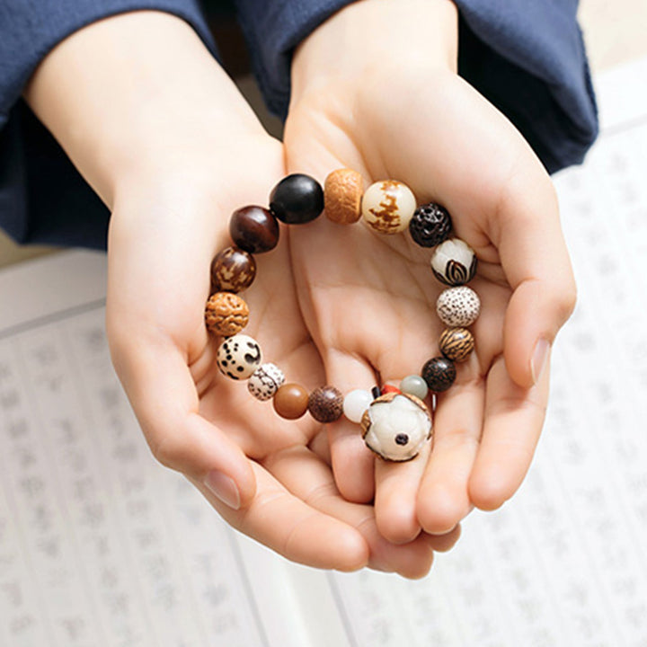 Bracciale Mala da polso Buddha Stones, semi di Bodhi, loto, saggezza, pace