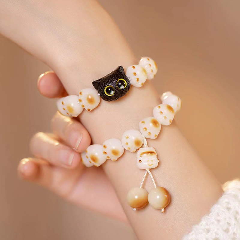 Buddha Stones Semi di Bodhi naturali Sandalo rosso Braccialetto della pace con zampa di gatto fortunato - image 3