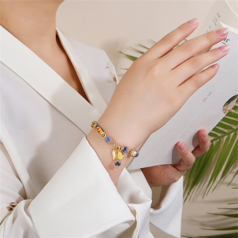 Braccialetto di forza con amuleto in agata blu caramella naturale Buddha Stones