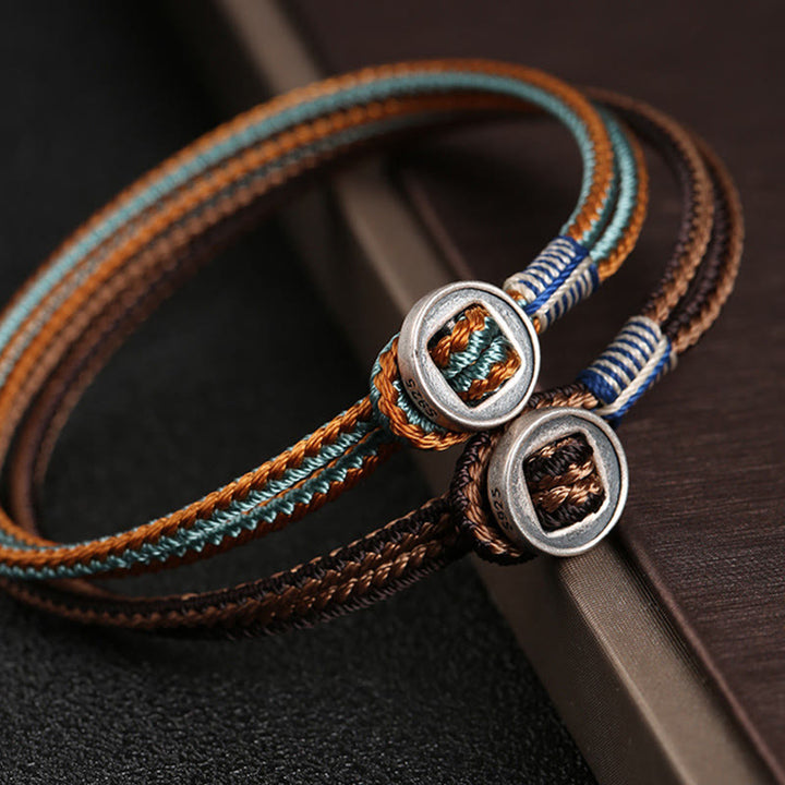 Braccialetto con cordino intrecciato di protezione con bottone fatto a mano in argento sterling 925 Buddha Stones