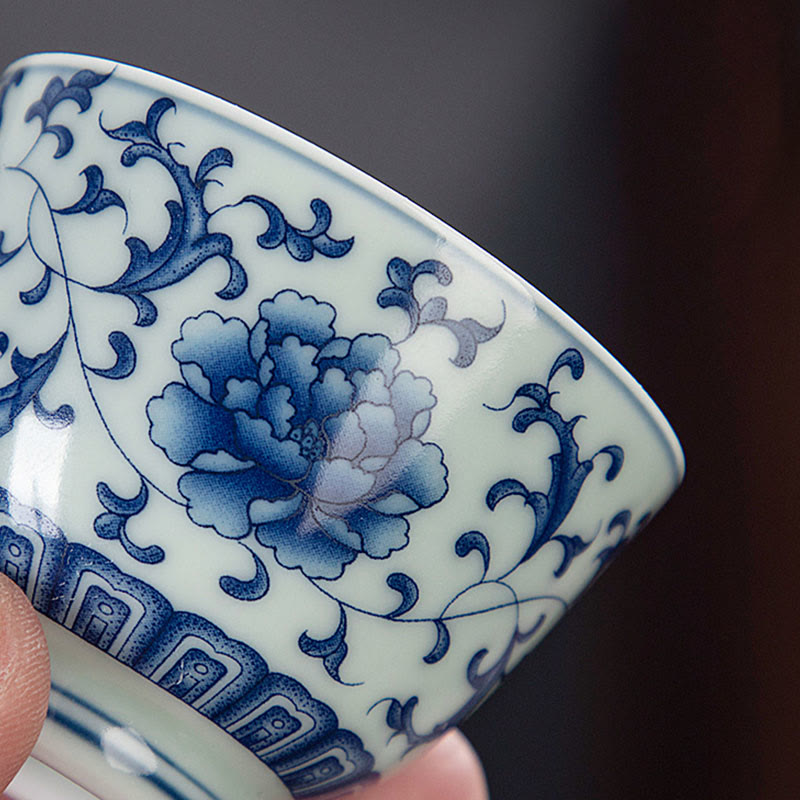 Buddha Stones Paesaggio blu Montagne Loto Gatto carino Padiglioni Magnolia Canna Aironi Tazza da tè in ceramica Piccola tazza da tè Kung Fu