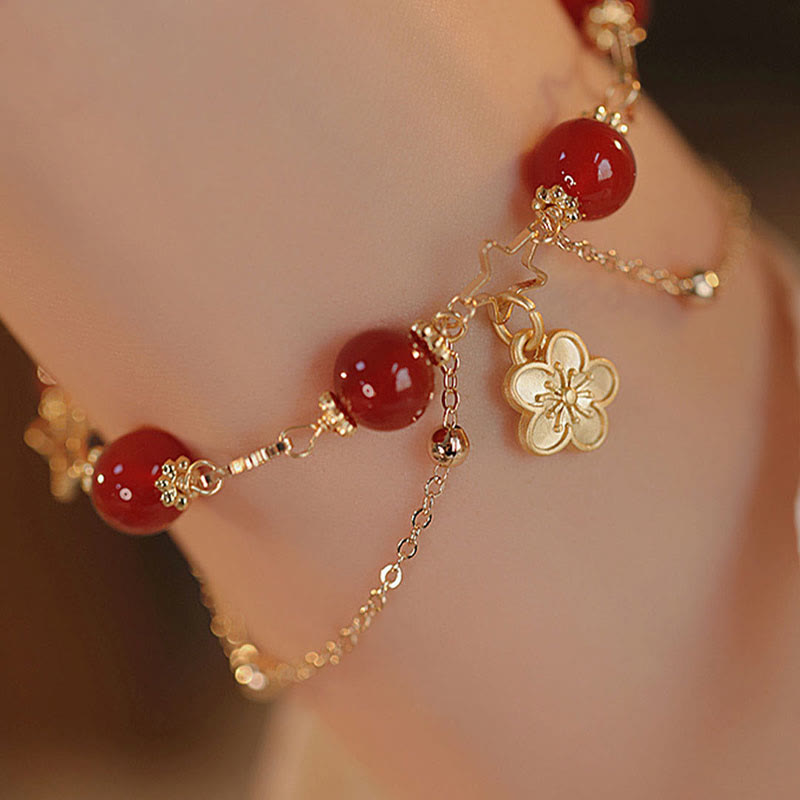 Bracciale Buddha Stones placcato oro 14k con ciondolo a forma di fiore di agata rossa e stella