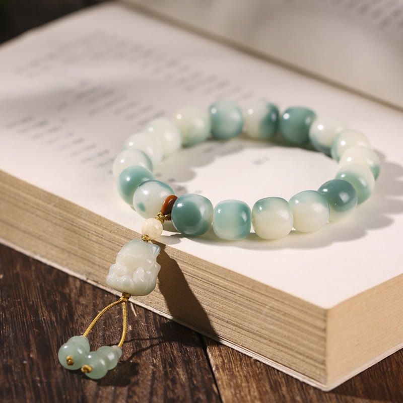 Bracciale della pace Buddha Stones, semi di Bodhi sfumati, volpe a nove code, zampa di gatto, artiglio di pigna - Volpe a nove code (Volpe a nove code colore casuale - circonferenza del polso 16-17 cm) - image 1