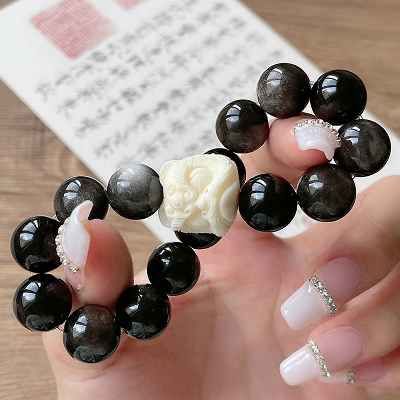 Braccialetto di protezione con leone danzante , Buddha Stones di avorio, seme di Bodhi, pietre di Buddha, argento lucido e ossidiana