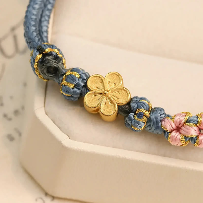 Braccialetto con corda della ricchezza con motivo a fiori di pesco