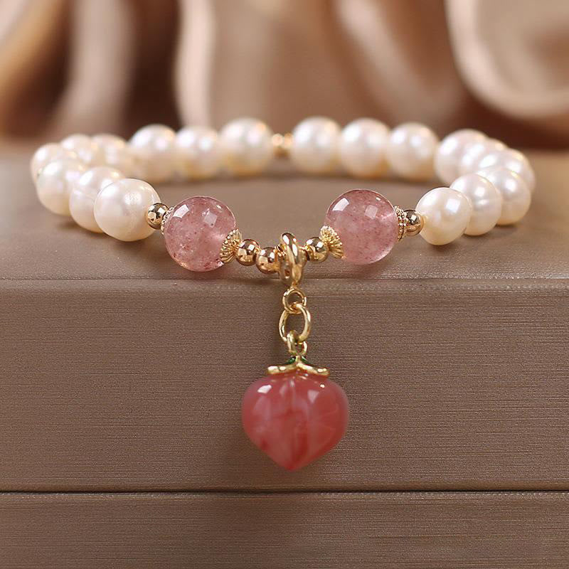Bracciale con ciondolo a forma di cuore, amore, saggezza, perle naturali, quarzo fragola e pesca Buddha Stones