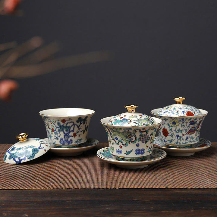 Buddha Stones Retro Prugna Fiore Pino Bambù Fenice Kirin Ceramica Gaiwan Sancai Tazza da tè Kung Fu Tazza da tè e piattino con coperchio