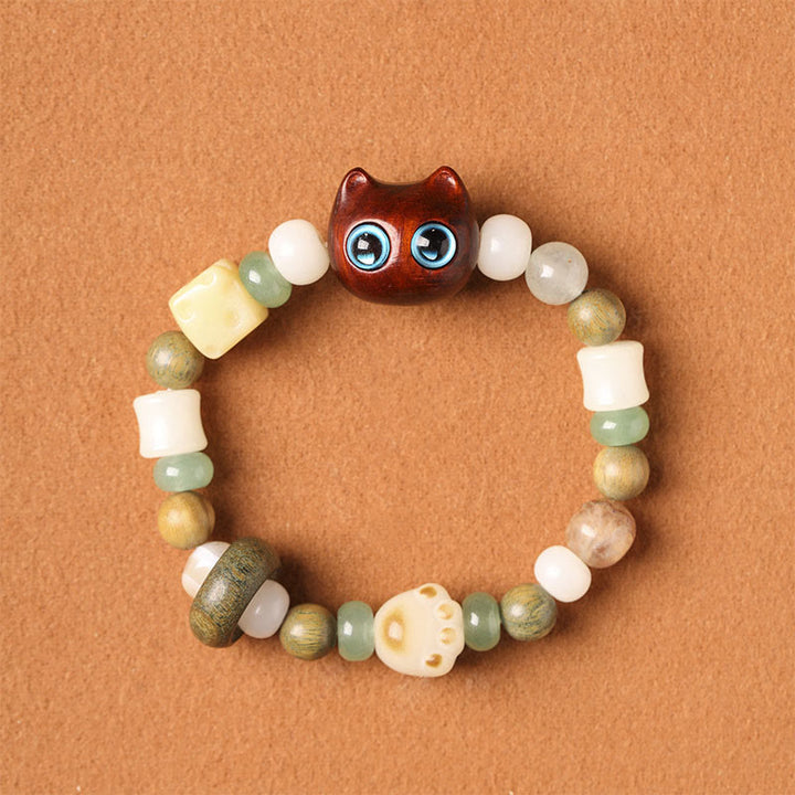 Buddha Stones Semi di Bodhi Sandalo verde Legno di ebano Foglia piccola Sandalo rosso Testa di gatto Zampa Artiglio Bracciale della pace - Gatto di sandalo rosso a foglia piccola (occhi azzurri) (circonferenza del polso 14-16 cm) - image 10