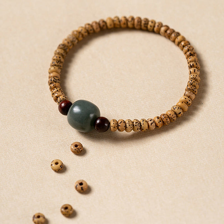 Braccialetto della saggezza Buddha Stones Bodhi Seed con piccola foglia di sandalo rosso