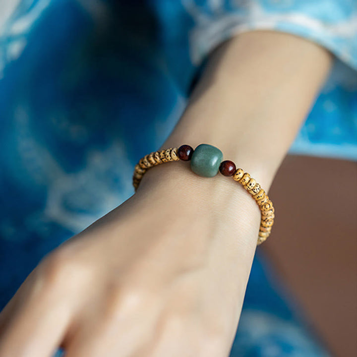 Braccialetto della saggezza Buddha Stones Bodhi Seed con piccola foglia di sandalo rosso