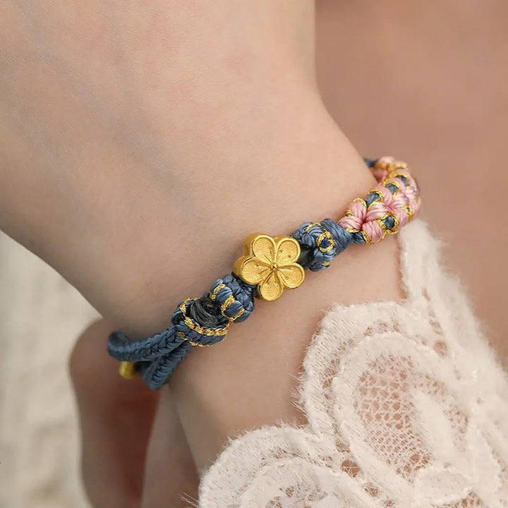 Braccialetto con corda della ricchezza con motivo a fiori di pesco