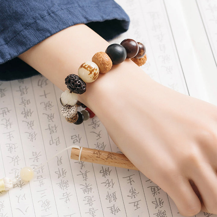 Bracciale Mala da polso Buddha Stones, semi di Bodhi, loto, saggezza, pace