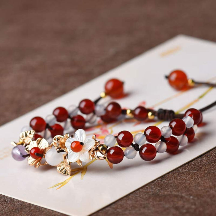 Braccialetto della fortuna con perline di fiore, petalo, avventurina verde e granato Buddha Stones