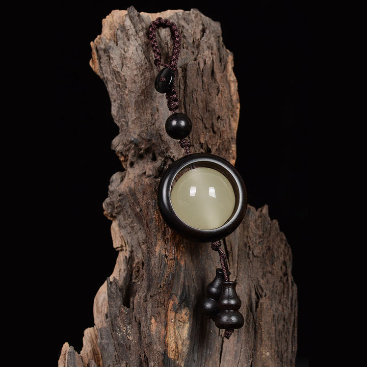 Buddha Stones Sandalo rosso Legno di ebano Sandalo verde Perlina portafortuna luminosa Zucca Portachiavi della pace