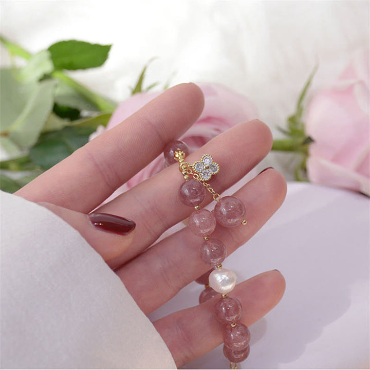 Braccialetto dell'amore con quadrifoglio a quattro foglie di perle di quarzo fragola naturale Buddha Stones