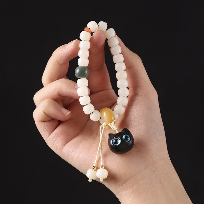 Buddha Stones Semi di Bodhi naturali Legno nero africano Bellissimo ciondolo a forma di gatto Braccialetto di pace e armonia - image 8