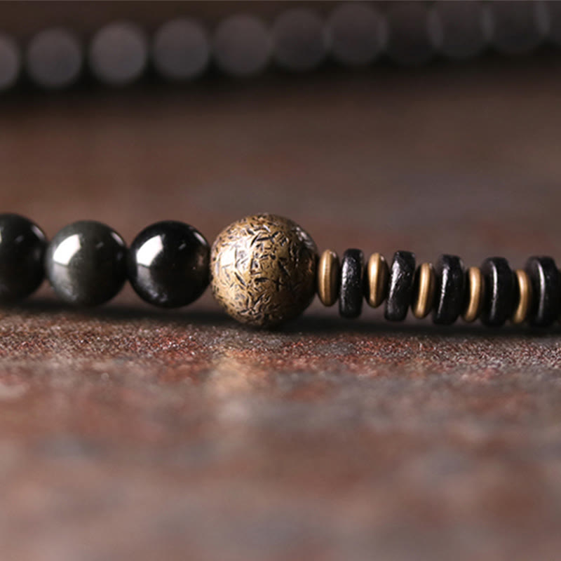 Braccialetto multistrato positivo in legno di ebano, ossidiana arcobaleno e rame Buddha Stones
