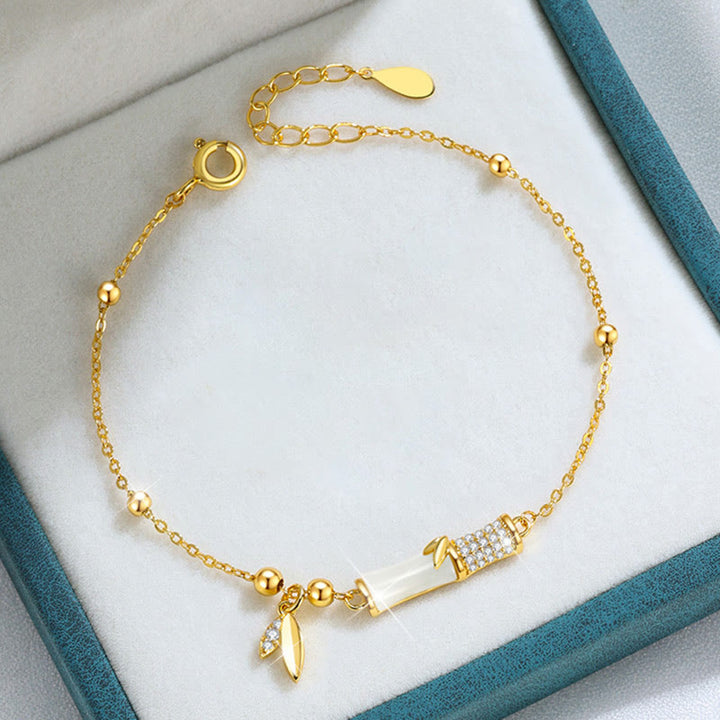 Bracciale Buddha Stones in argento sterling 925 placcato oro 18K con foglia di giada bianca e zircone di bambù