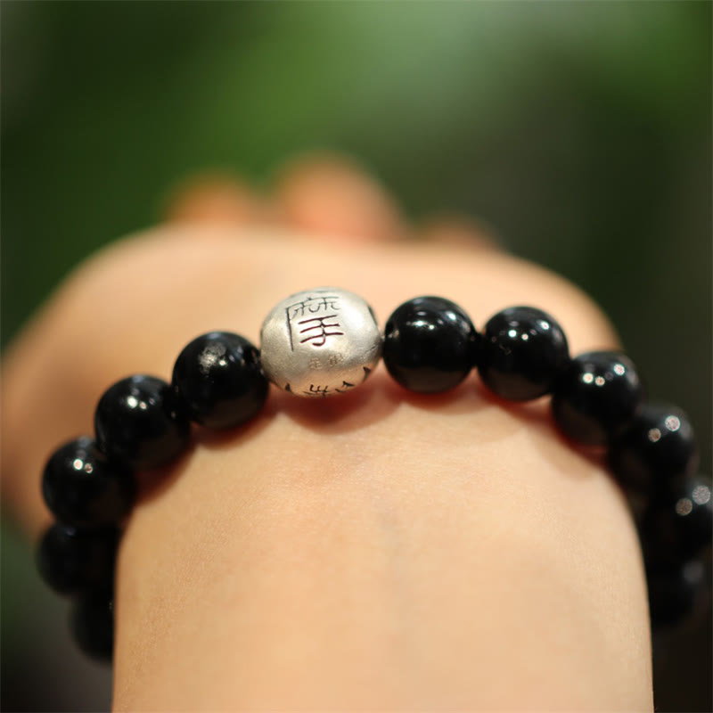 Braccialetto di protezione con perline di onice nero in argento sterling 925 Buddha Stones con incisione del personaggio
