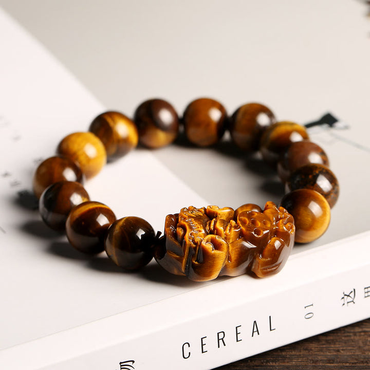 Braccialetto della ricchezza con occhio di tigre naturale Buddha Stones