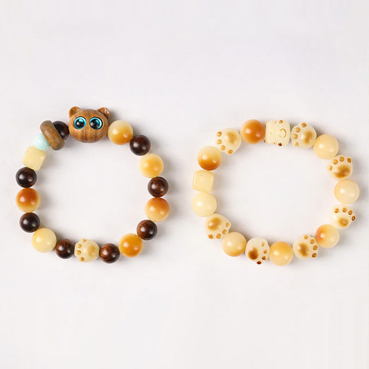 Buddha Stones Semi di Bodhi naturali Sandalo Fortunato Gatto Carino Testa Zampa Artiglio Braccialetto della Pace - image 23