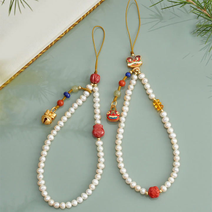 Buddha Stones Perla naturale Cinabro Borsa per soldi Campana Oro Bestia che deglutisce Leone danzante Guarigione Telefono Decorazione appesa